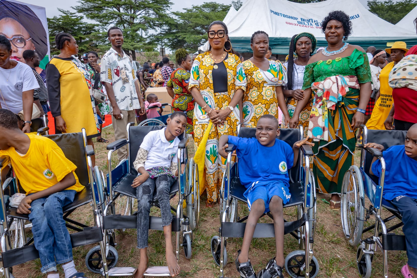 Happy family supporting a child